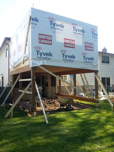 Building addition, house wrap