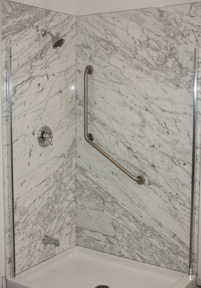 Carrara White custom shower.