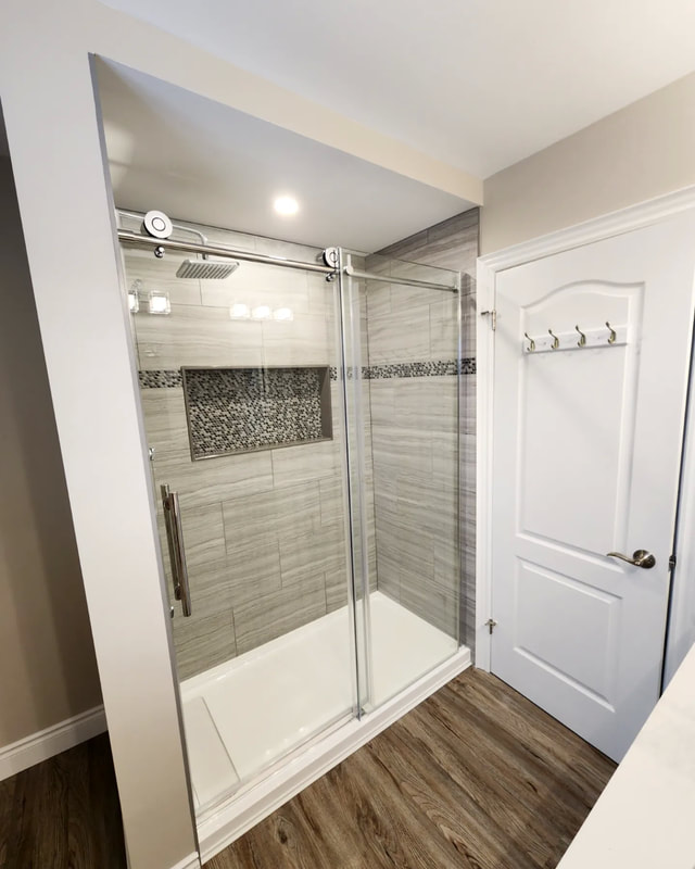 Custom Shower with tile, glass package and Niche.